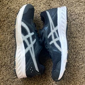 Black ASICS tennis shoe